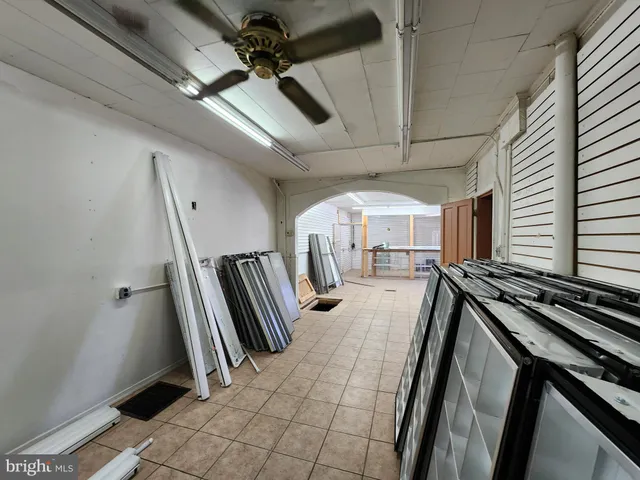 a bathroom with a shower and dryer
