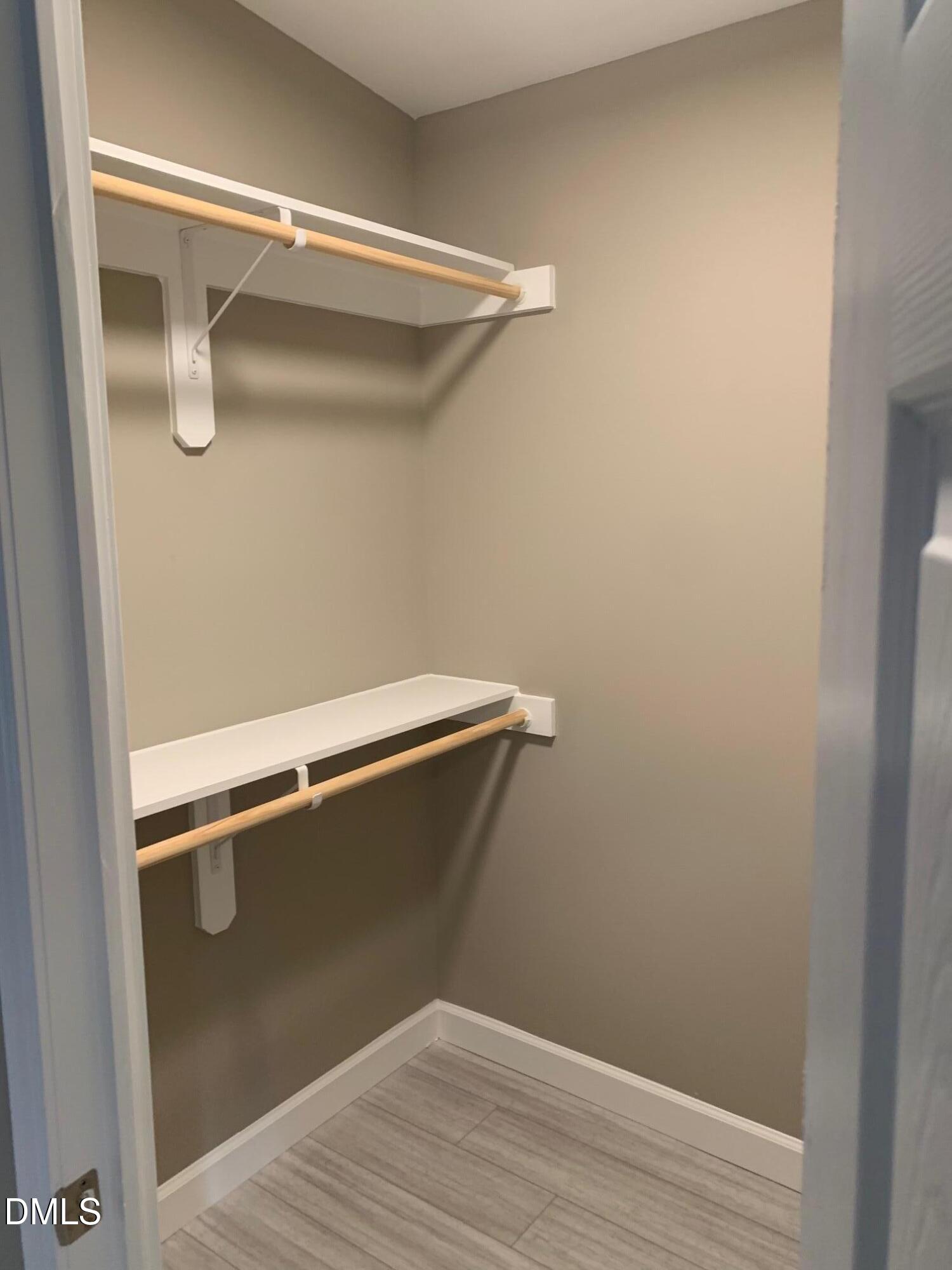 204 Deep Woods Trail Roxboro, NC 27574 - Photo 17 of 28 a view of a room with racks on the wall