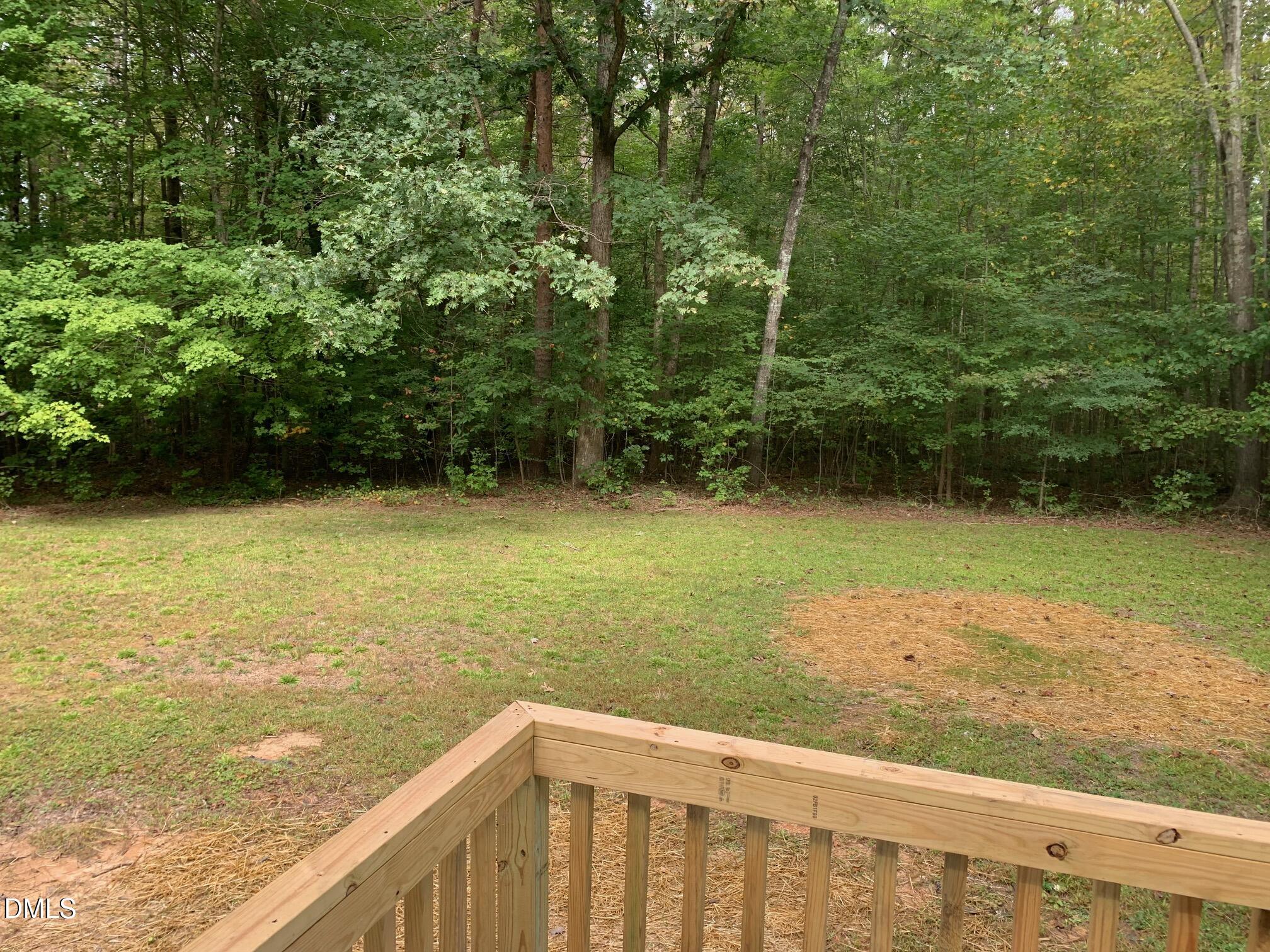 204 Deep Woods Trail Roxboro, NC 27574 - Photo 27 of 28 a view of a lake from a balcony