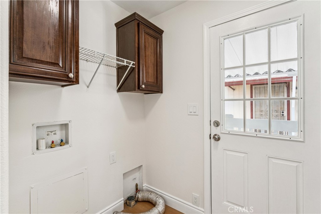 10550 Dunlap Crossing Road, Unit 141 Whittier, CA 90606 - Photo 13 of 38 a bathroom with a sink and mirror