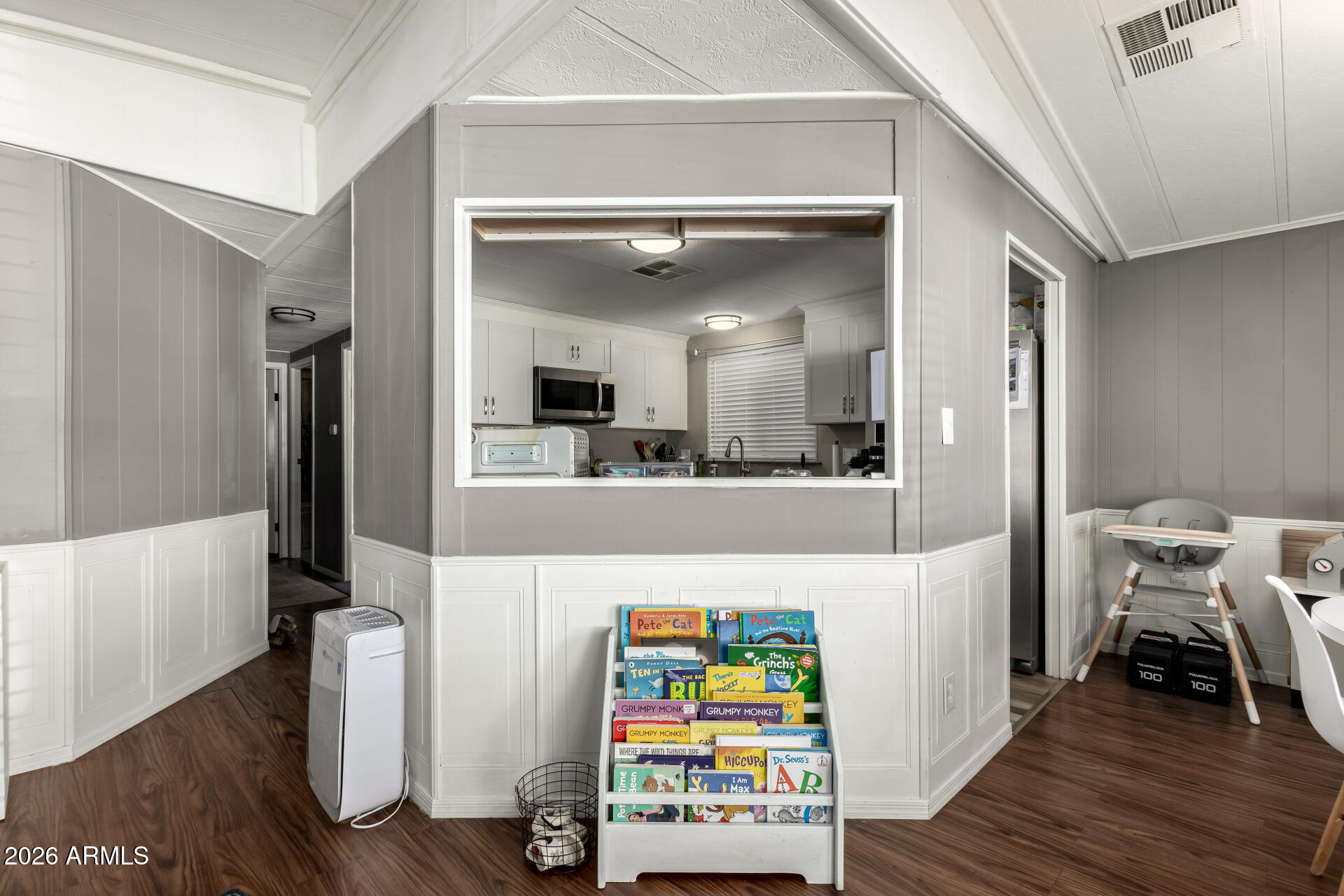 245 South 56th Street, Unit 64 Mesa, AZ 85206 - Photo 11 of 35 a view of kitchen with furniture and wooden floor