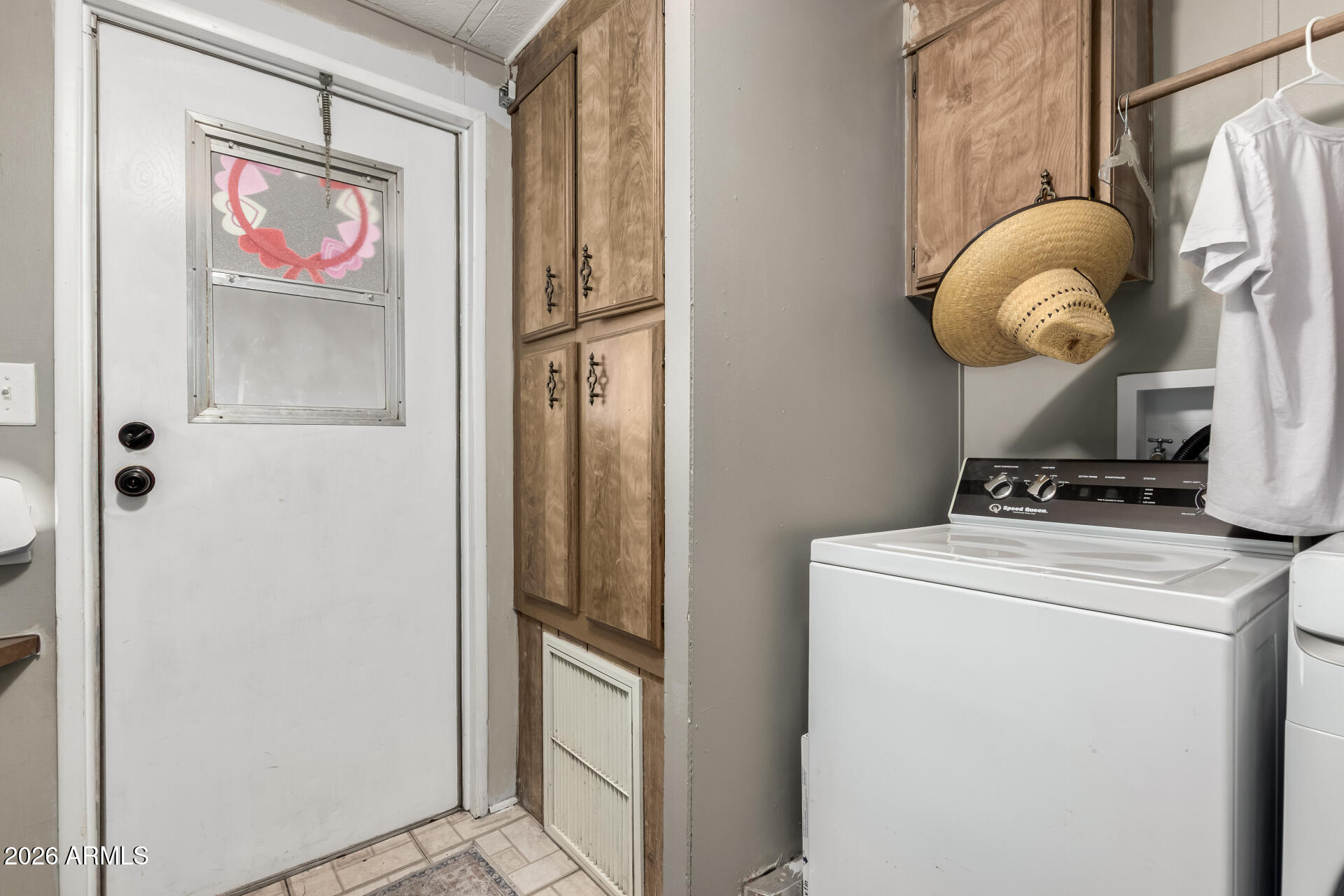 245 South 56th Street, Unit 64 Mesa, AZ 85206 - Photo 22 of 35 a bathroom with a sink and a mirror