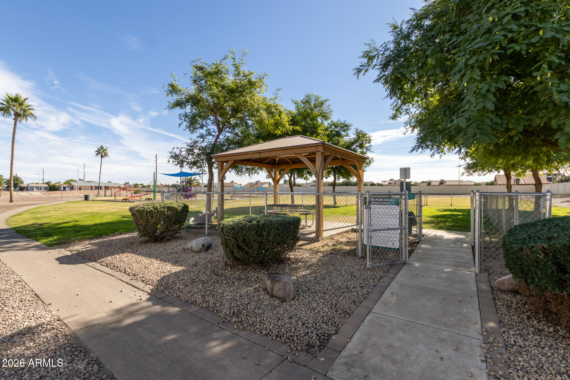245 South 56th Street, Unit 64 Mesa, AZ 85206 - Photo 29 of 35 a view of a backyard with sitting area