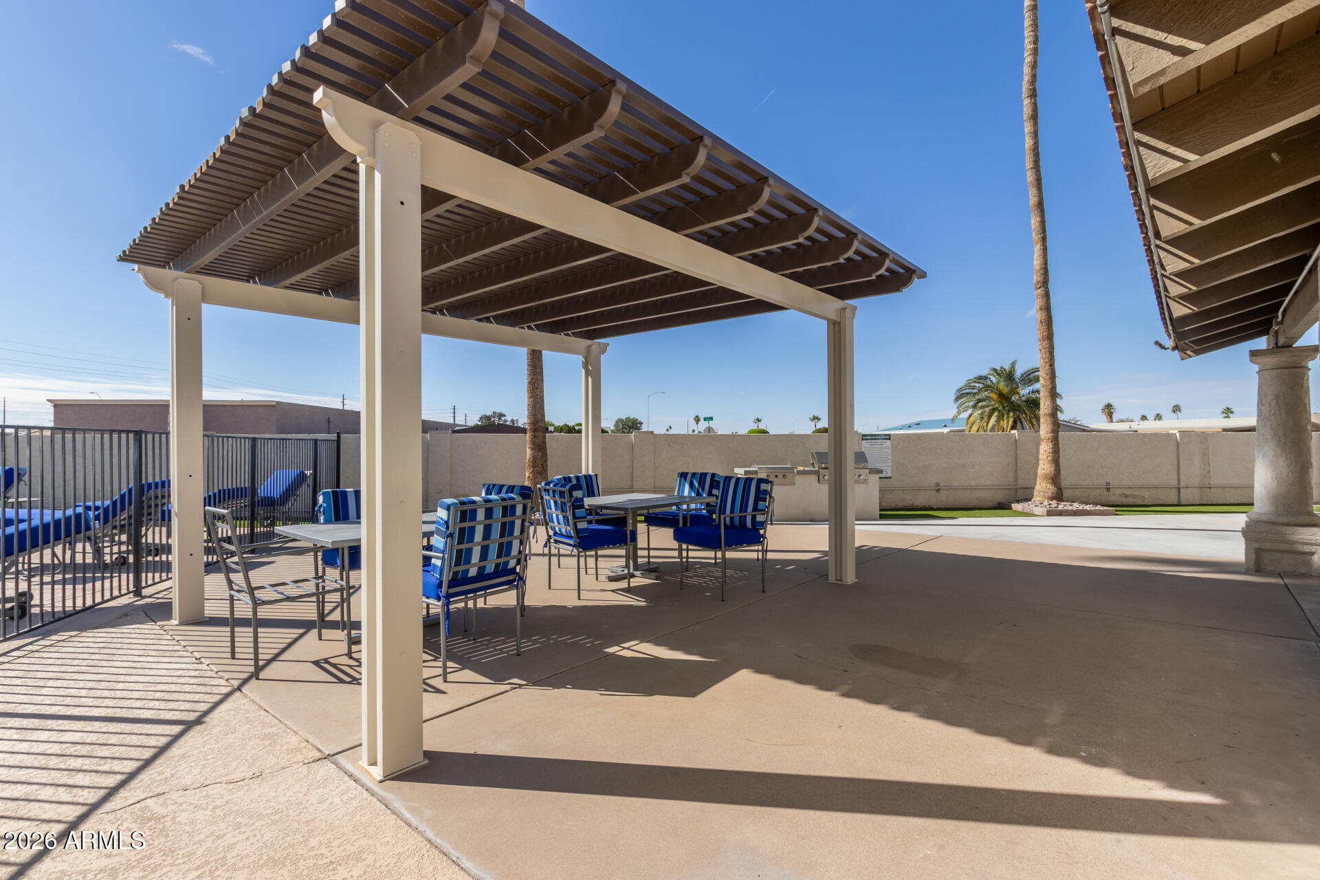 245 South 56th Street, Unit 64 Mesa, AZ 85206 - Photo 34 of 35 a view of kitchen with table and chairs