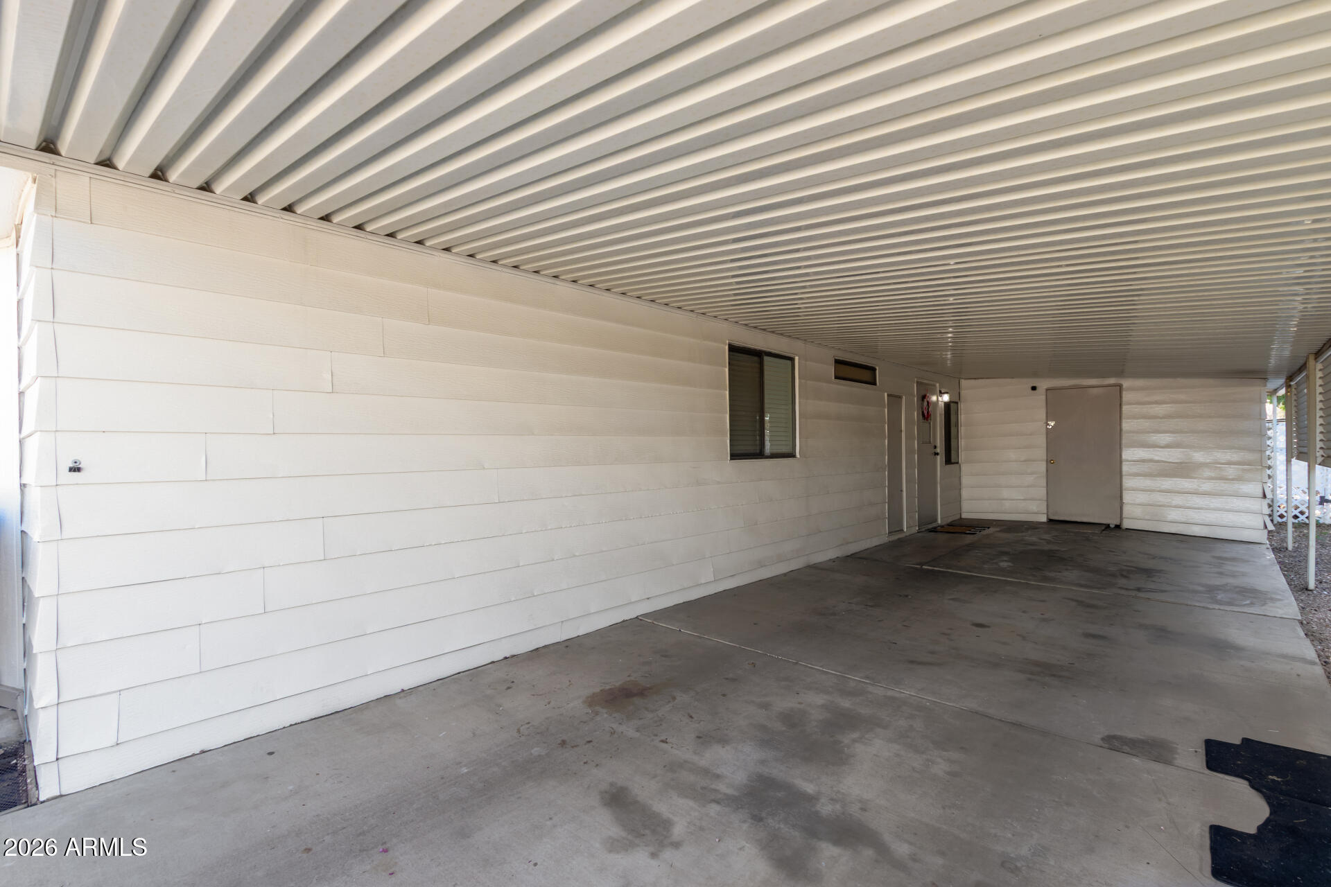 245 South 56th Street, Unit 64 Mesa, AZ 85206 - Photo 7 of 35 a view of a garage