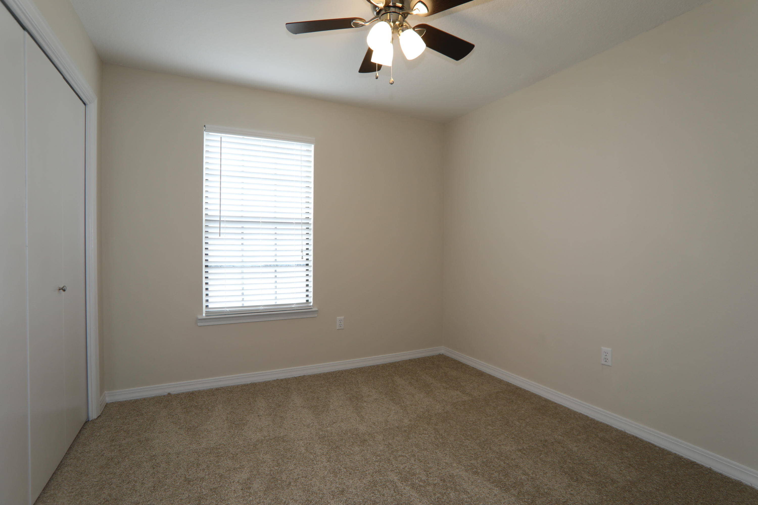102 Brian Drive Crestview, FL 32536 - Photo 16 of 21 an empty room with a window