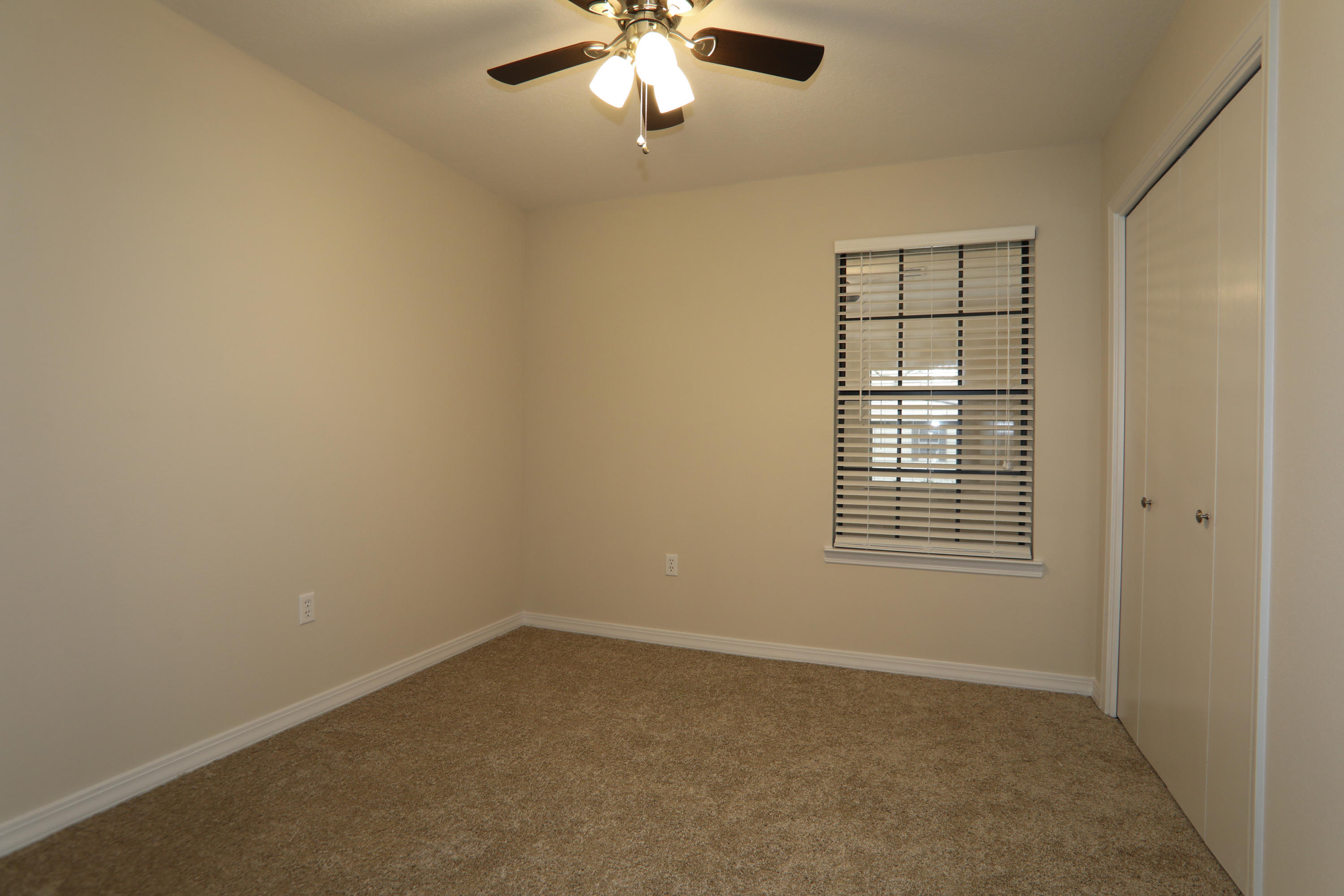 102 Brian Drive Crestview, FL 32536 - Photo 17 of 21 an empty room with a window
