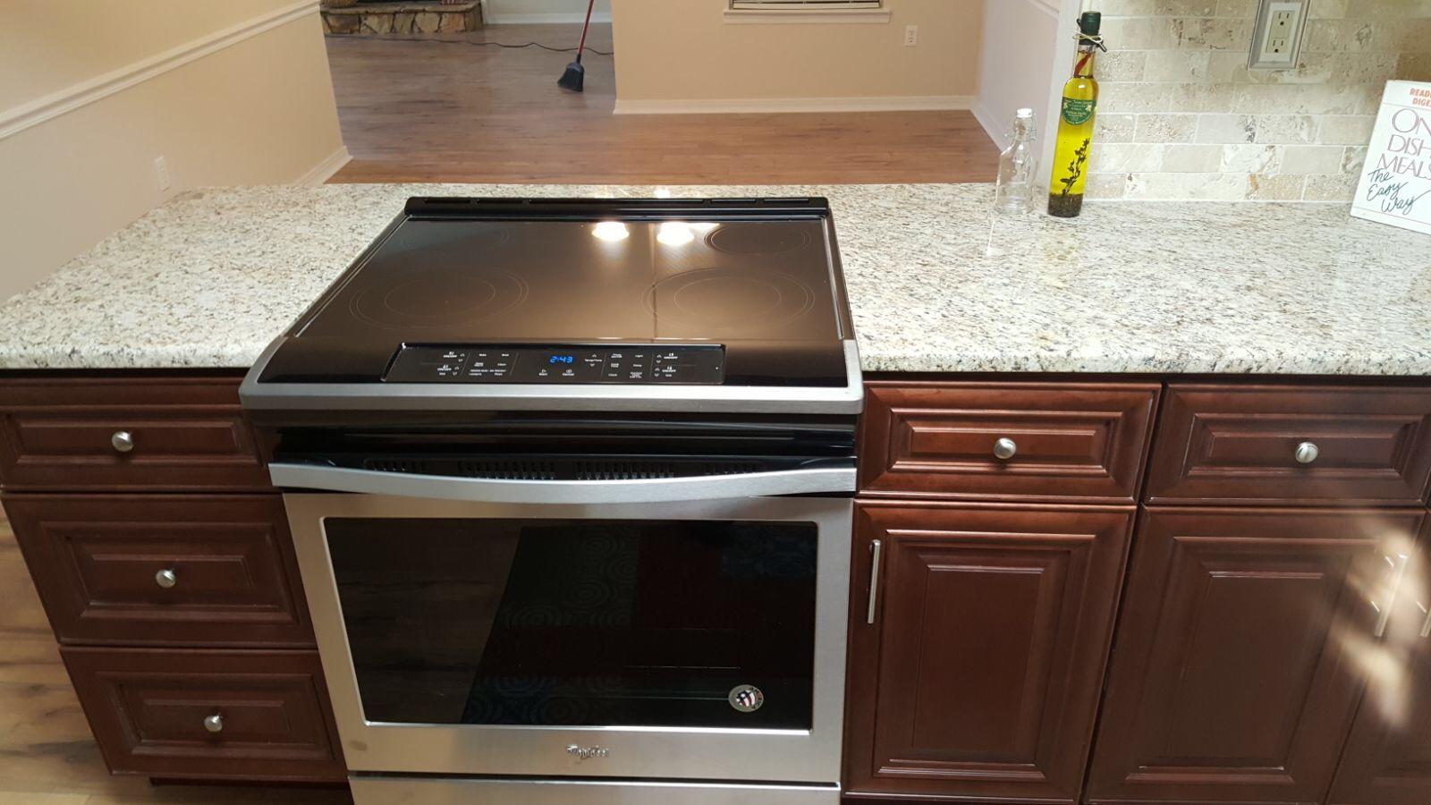 102 Brian Drive Crestview, FL 32536 - Photo 3 of 21 a stove top oven sitting inside of a kitchen