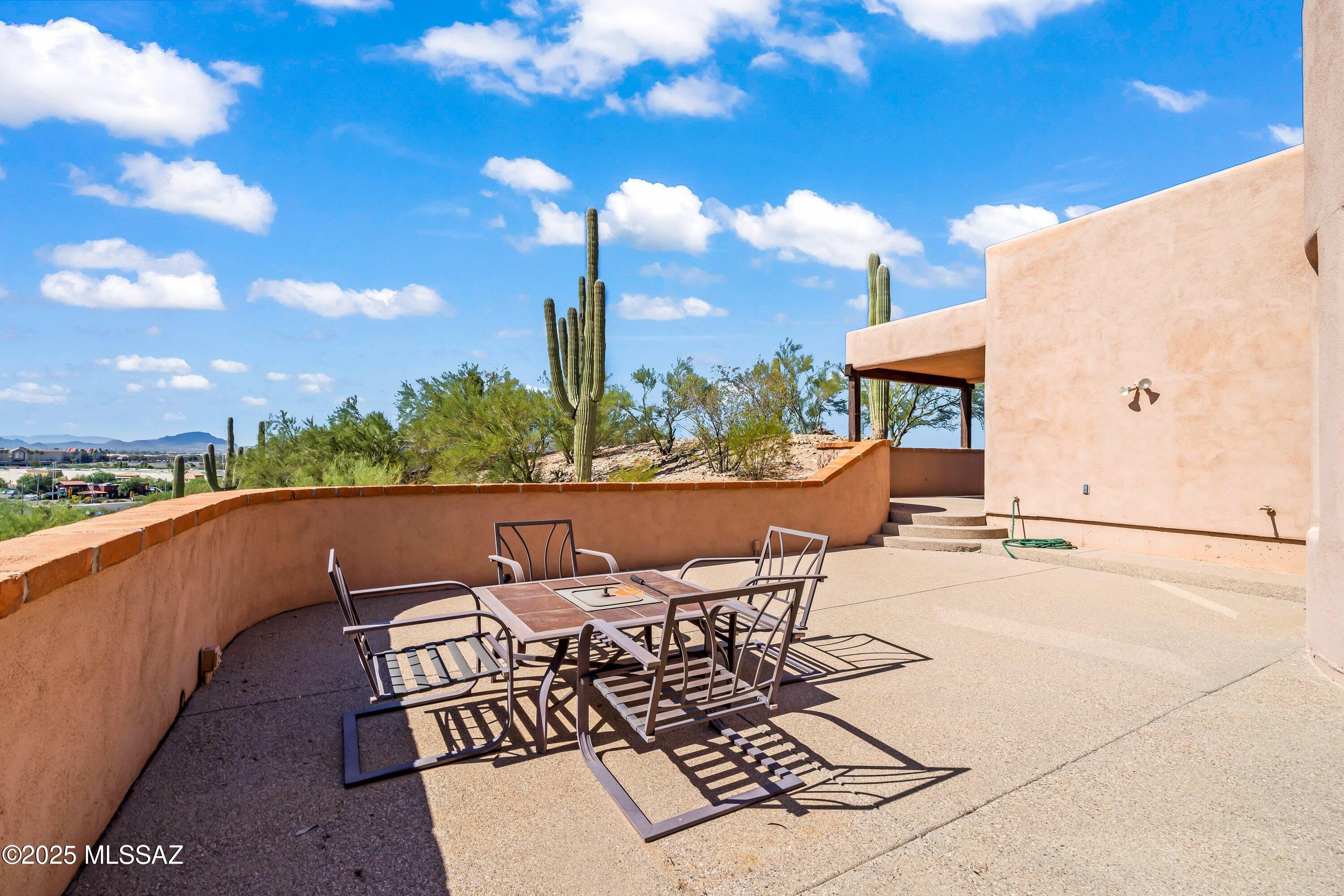 30 West Stone Loop Tucson, AZ 85704 - Photo 3 of 26 a view of a terrace with furniture