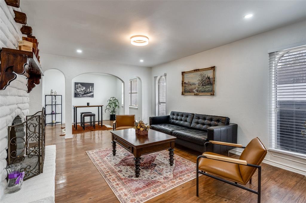 15642 Overmead Circle Dallas, TX 75248 - Photo 10 of 24 a living room with furniture and wooden floor