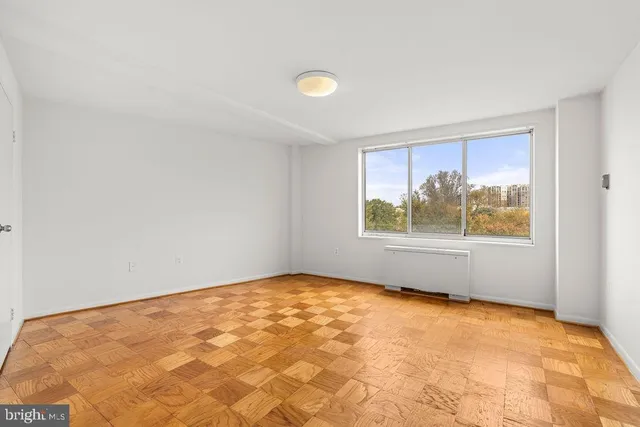 an empty room with window