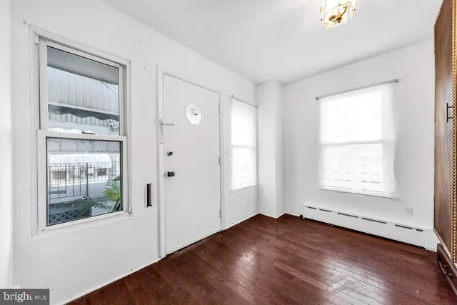 an empty room with windows