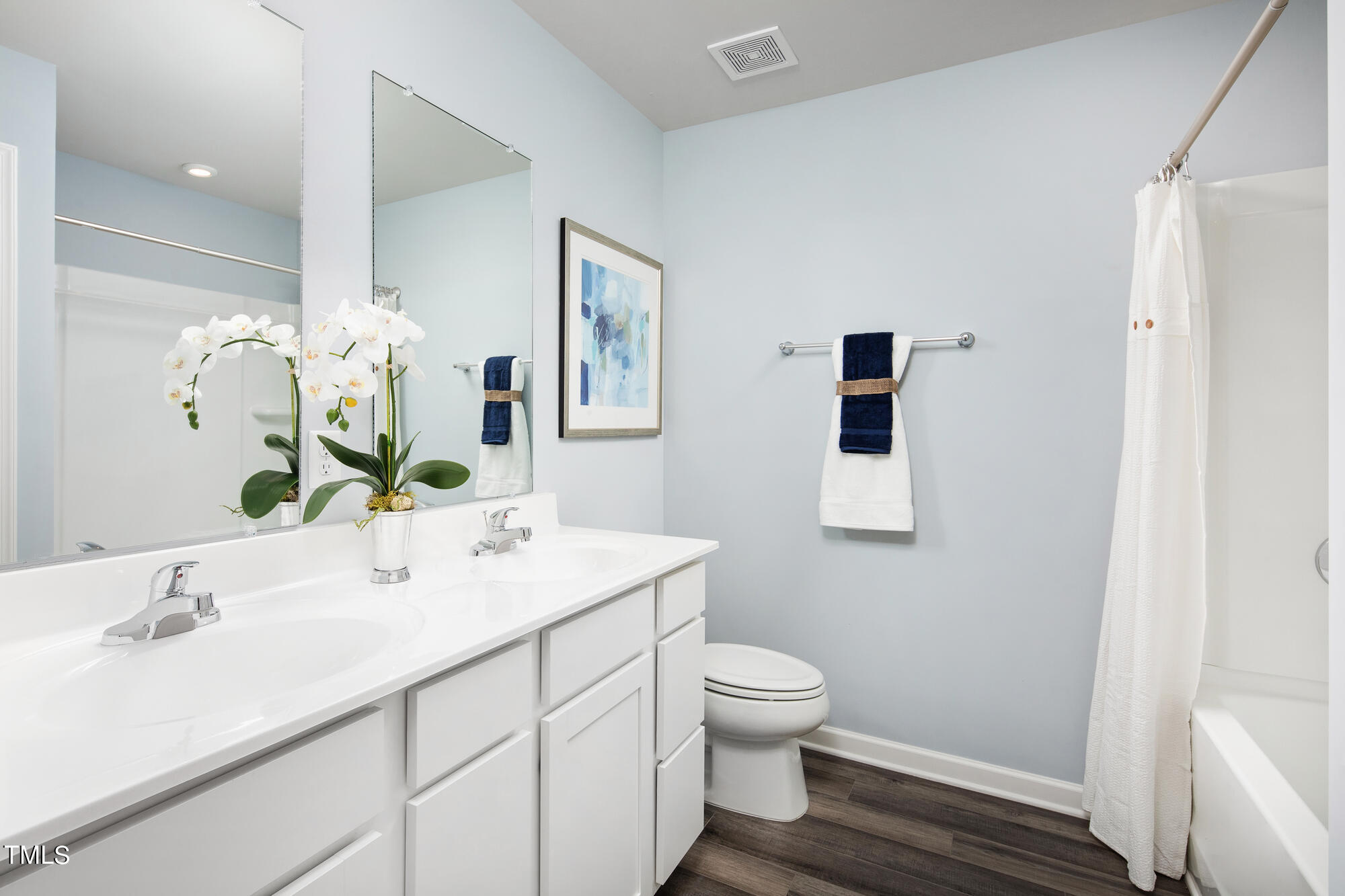 126 Elyse Overlook Loop Sanford, NC 27332 - Photo 11 of 13 a bathroom with a sink toilet and a mirror
