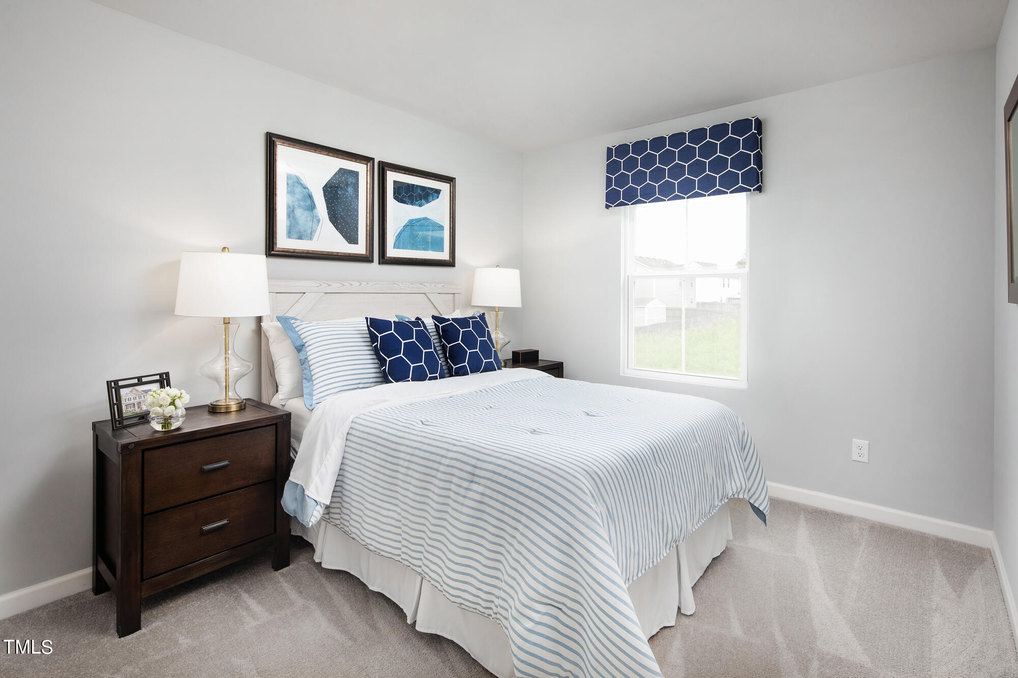 126 Elyse Overlook Loop Sanford, NC 27332 - Photo 13 of 13 a bedroom with a bed and a window