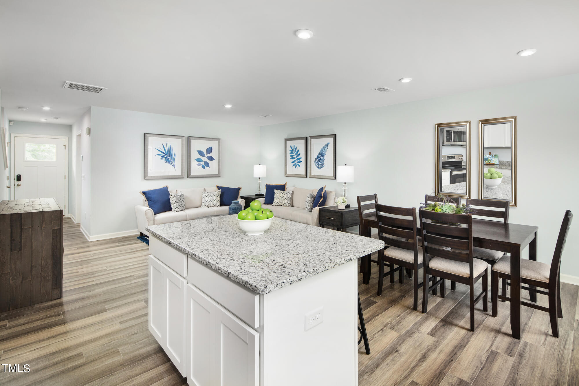 126 Elyse Overlook Loop Sanford, NC 27332 - Photo 8 of 13 a view of a dining room with furniture and wooden floor