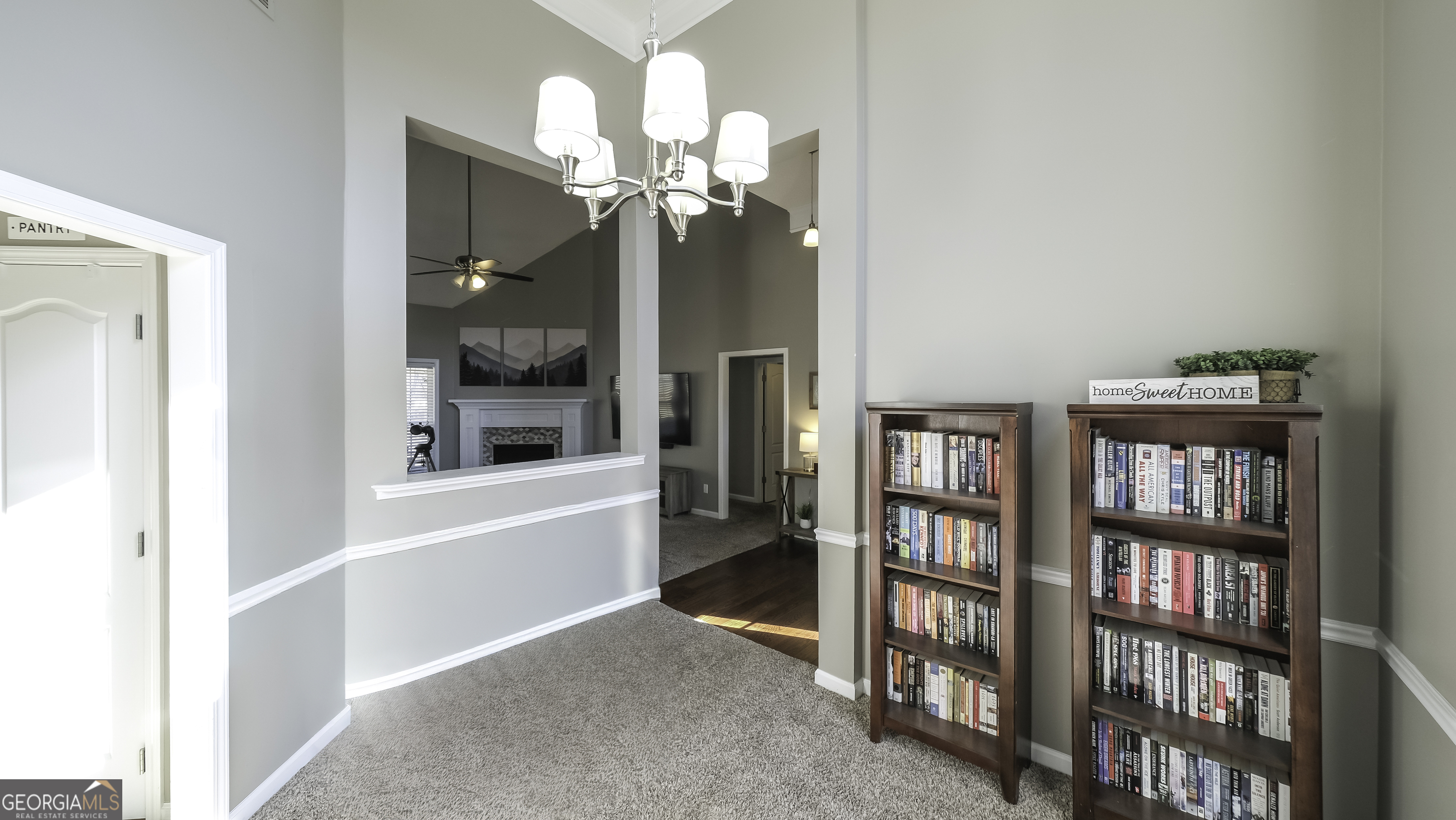 116 Kyle Way Carrollton, GA 30117 - Photo 11 of 30 a view of a livingroom with a book shelf