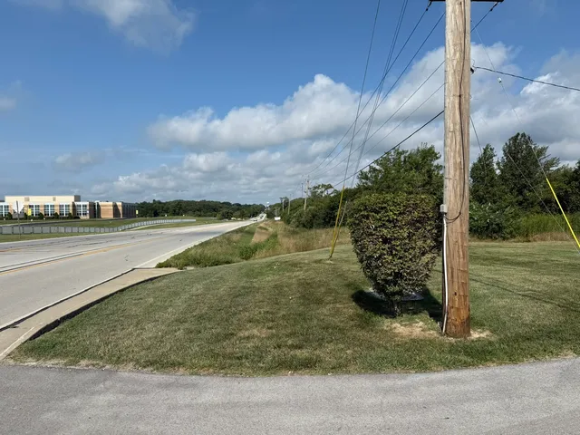 a view of a lake with a yard