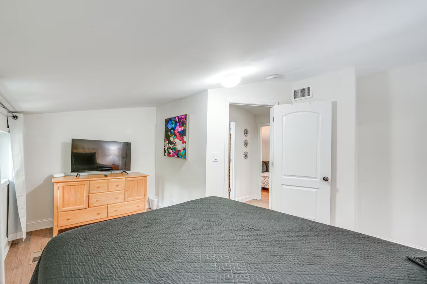 1518 Riverside Avenue St. Charles, IL 60174 - Photo 21 of 32 a bedroom with a bed and a flat screen tv