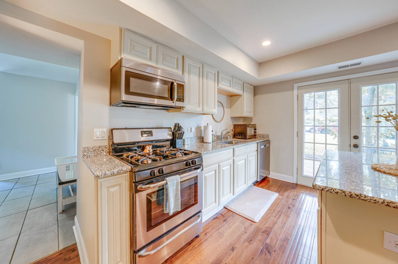 1518 Riverside Avenue St. Charles, IL 60174 - Photo 10 of 32 a kitchen with a stove and a wooden floors
