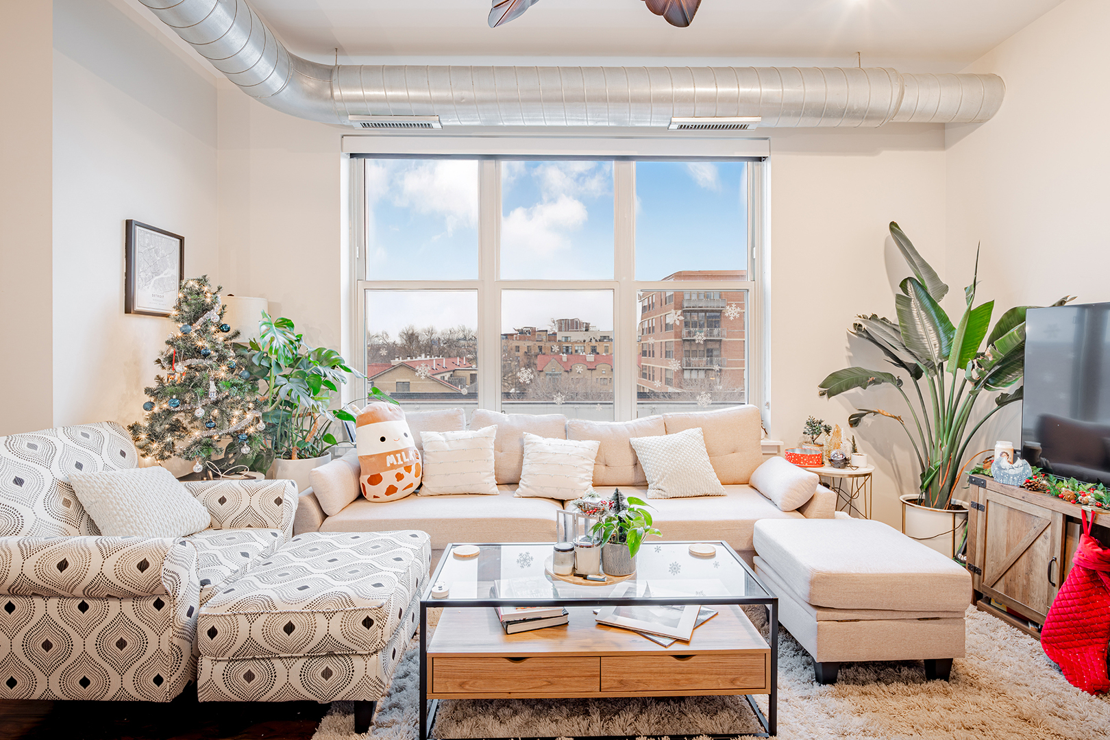 1228 West Monroe Street, Unit 504 Chicago, IL 60607 - Photo 11 of 23 a living room with furniture and a large window