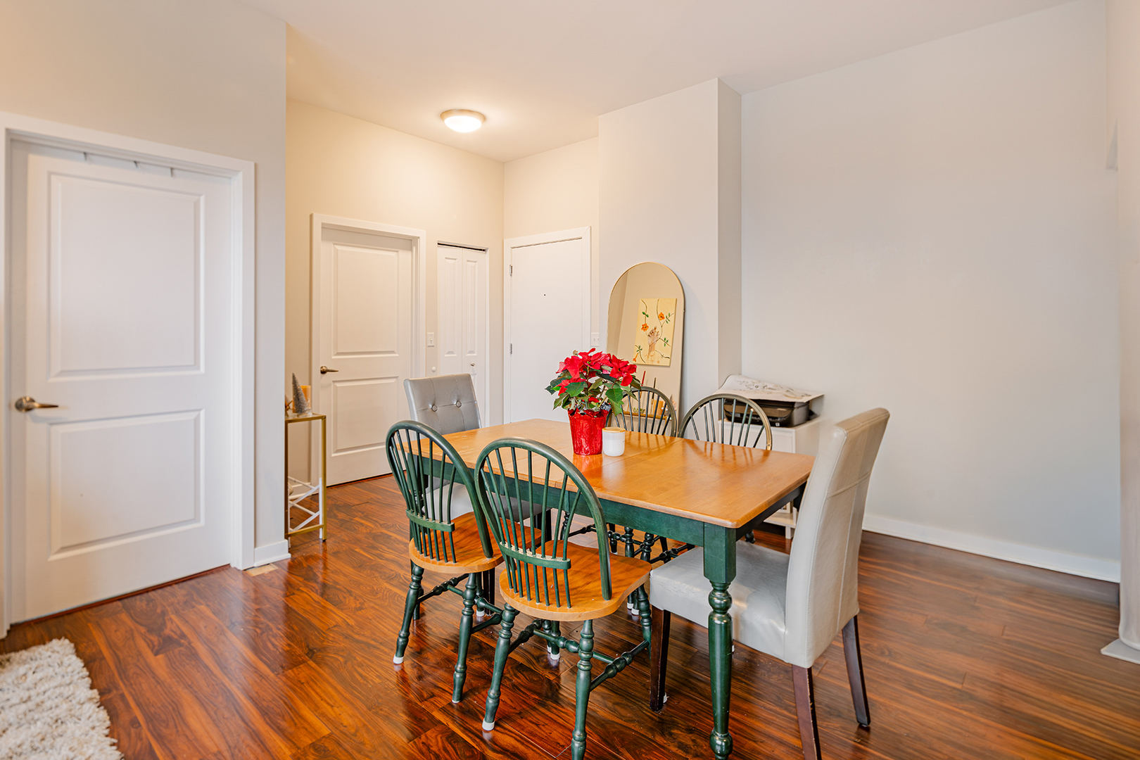 1228 West Monroe Street, Unit 504 Chicago, IL 60607 - Photo 5 of 23 a view of a dining room with furniture and wooden floor