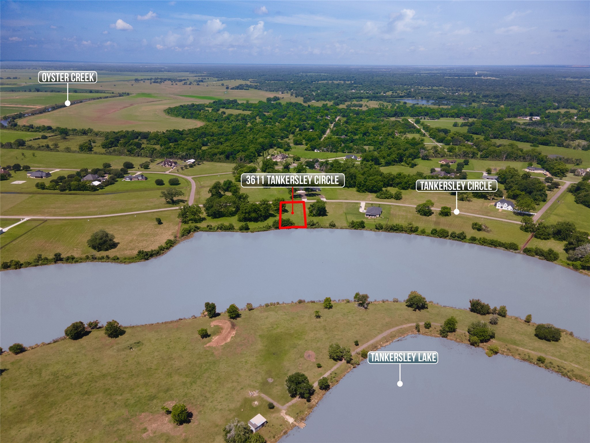 3611 Tankersley Circle Rosharon, TX 77583 - Photo 2 of 10 an aerial view of a house with a lake view