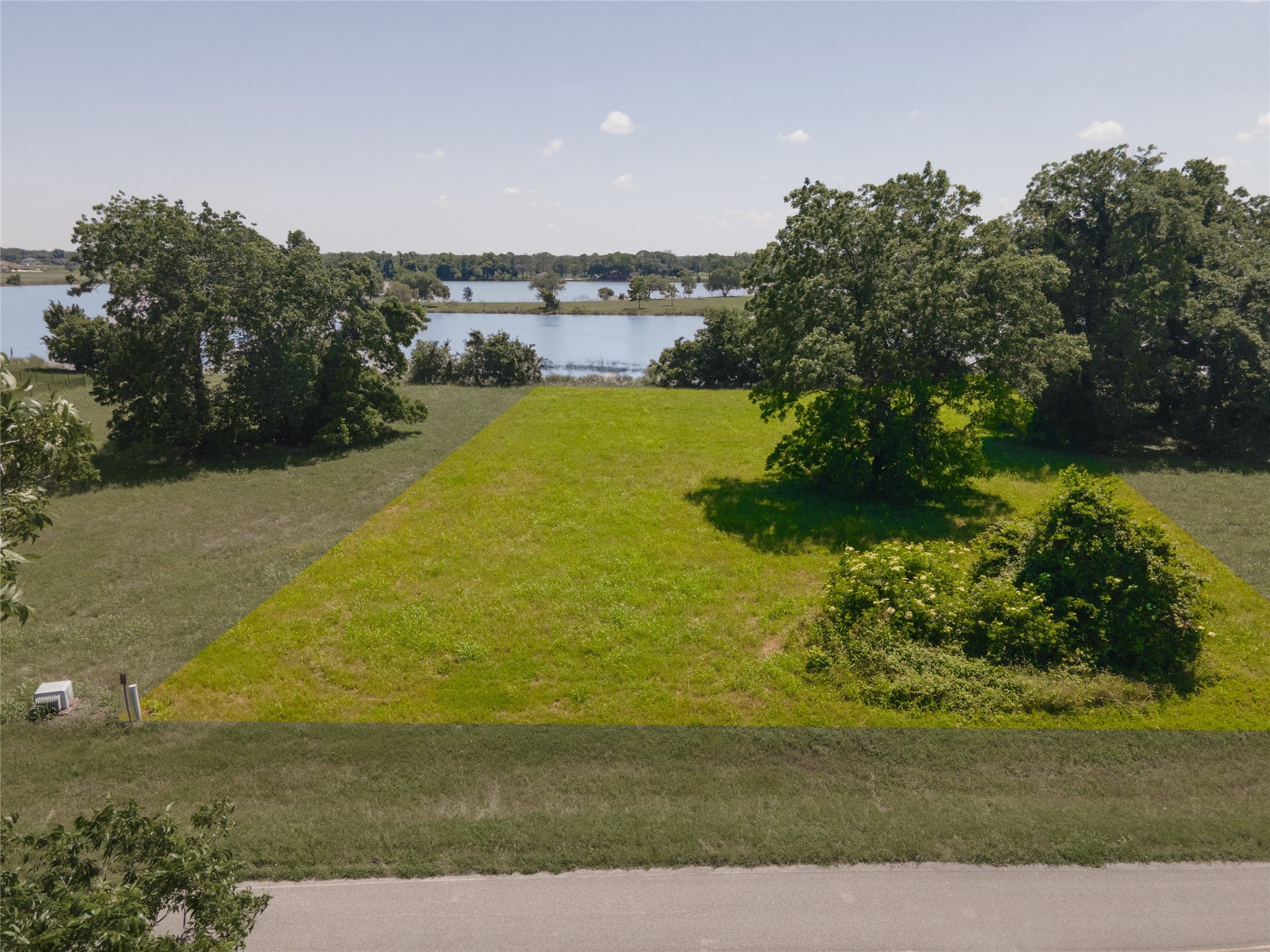 3611 Tankersley Circle Rosharon, TX 77583 - Photo 5 of 10 a view of a lake with a yard