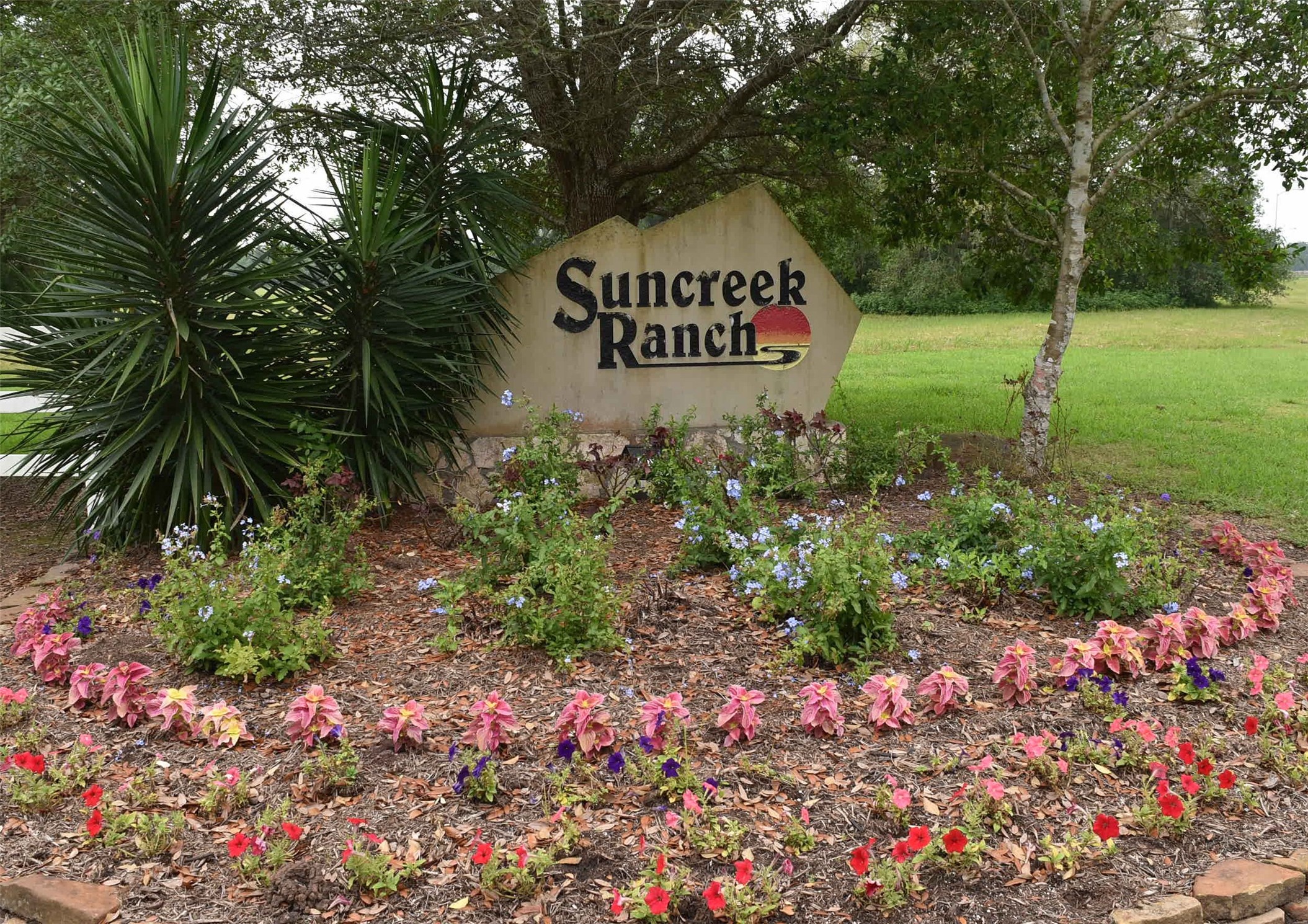 3611 Tankersley Circle Rosharon, TX 77583 - Photo 7 of 10 a sign that is sitting in front of flowers