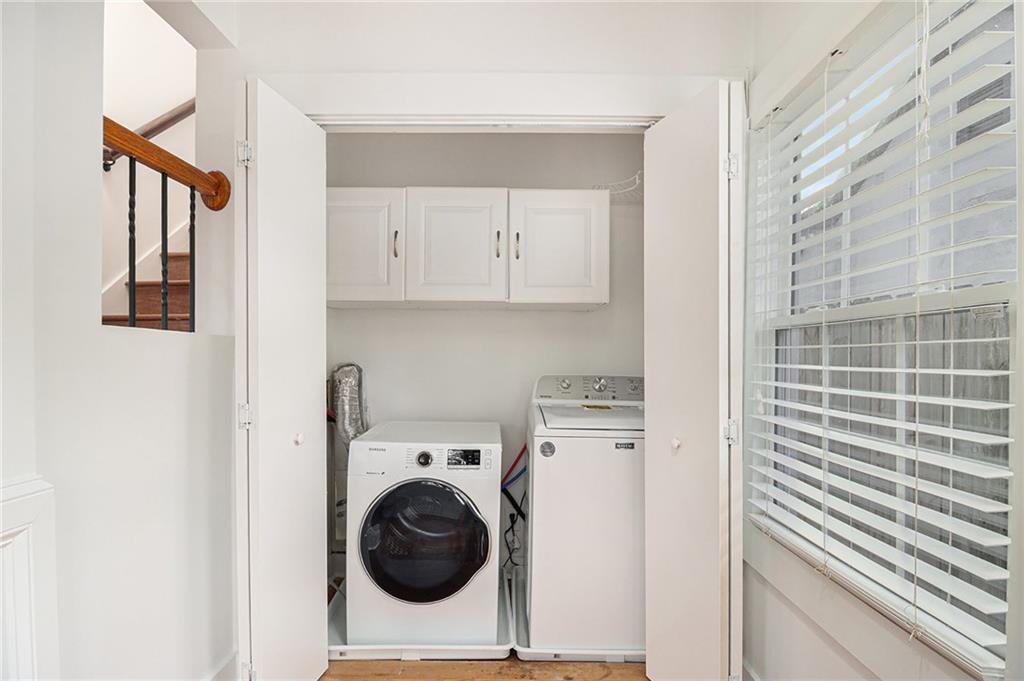 1719 Flat Shoals Road Southeast Atlanta, GA 30316 - Photo 14 of 28 a utility room with dryer and washer