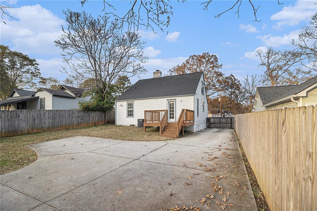 1719 Flat Shoals Road Southeast Atlanta, GA 30316 - Photo 27 of 28 a view of a house with backyard