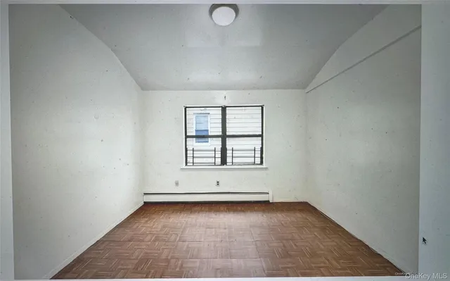 an empty room with a window