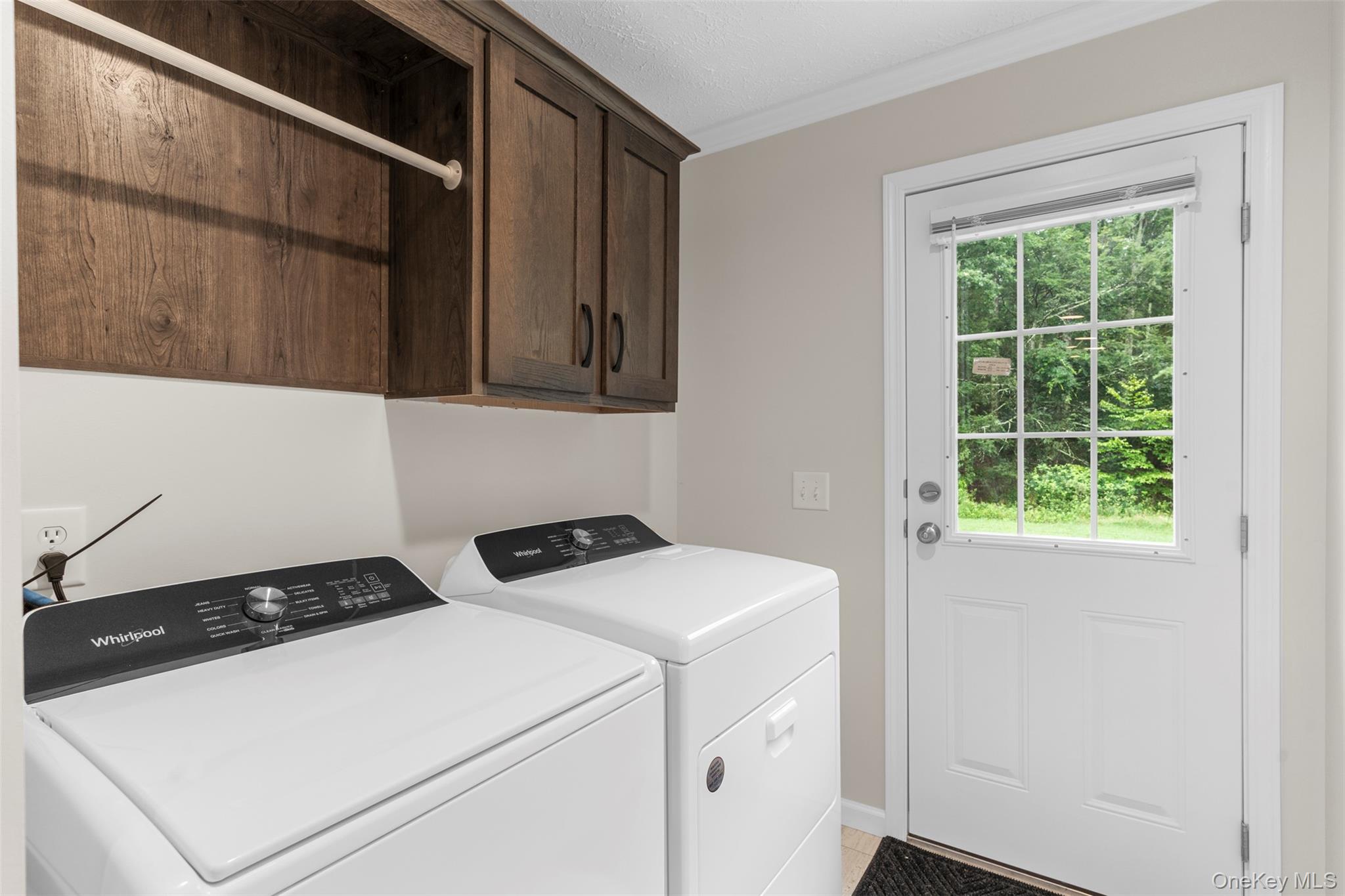 242 Ruby Road, Unit 18 Kingston, NY 12401 - Photo 13 of 23 a utility room with dryer and washer