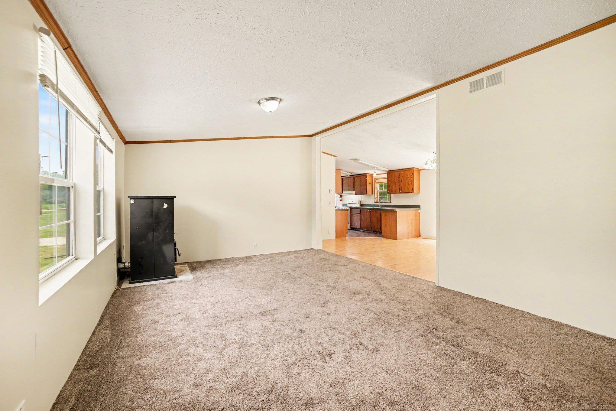 1717 West Townline 16 Road Pinconning, MI 48650 - Photo 5 of 27 50213801-fc2134a1-863c-432d-a6c2-93b8ef4330cf.JPG