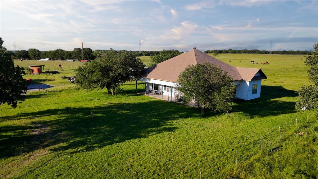 18100 Farm To Market 920 Poolville, TX 76487 - Photo 2 of 32 a view of a garden