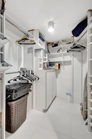 a bedroom with a bed and a table