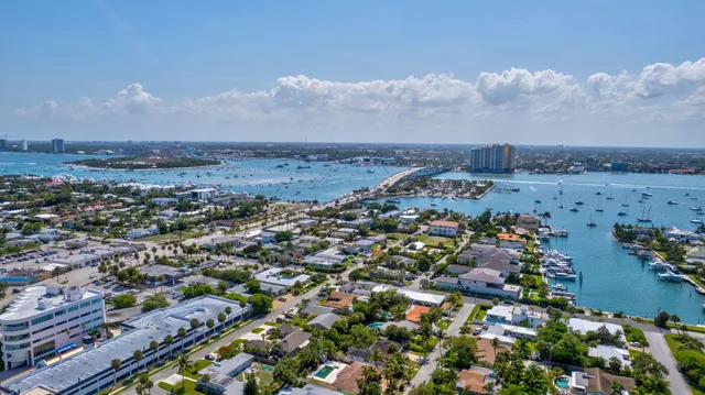 a large dining space with furniture window and outside view