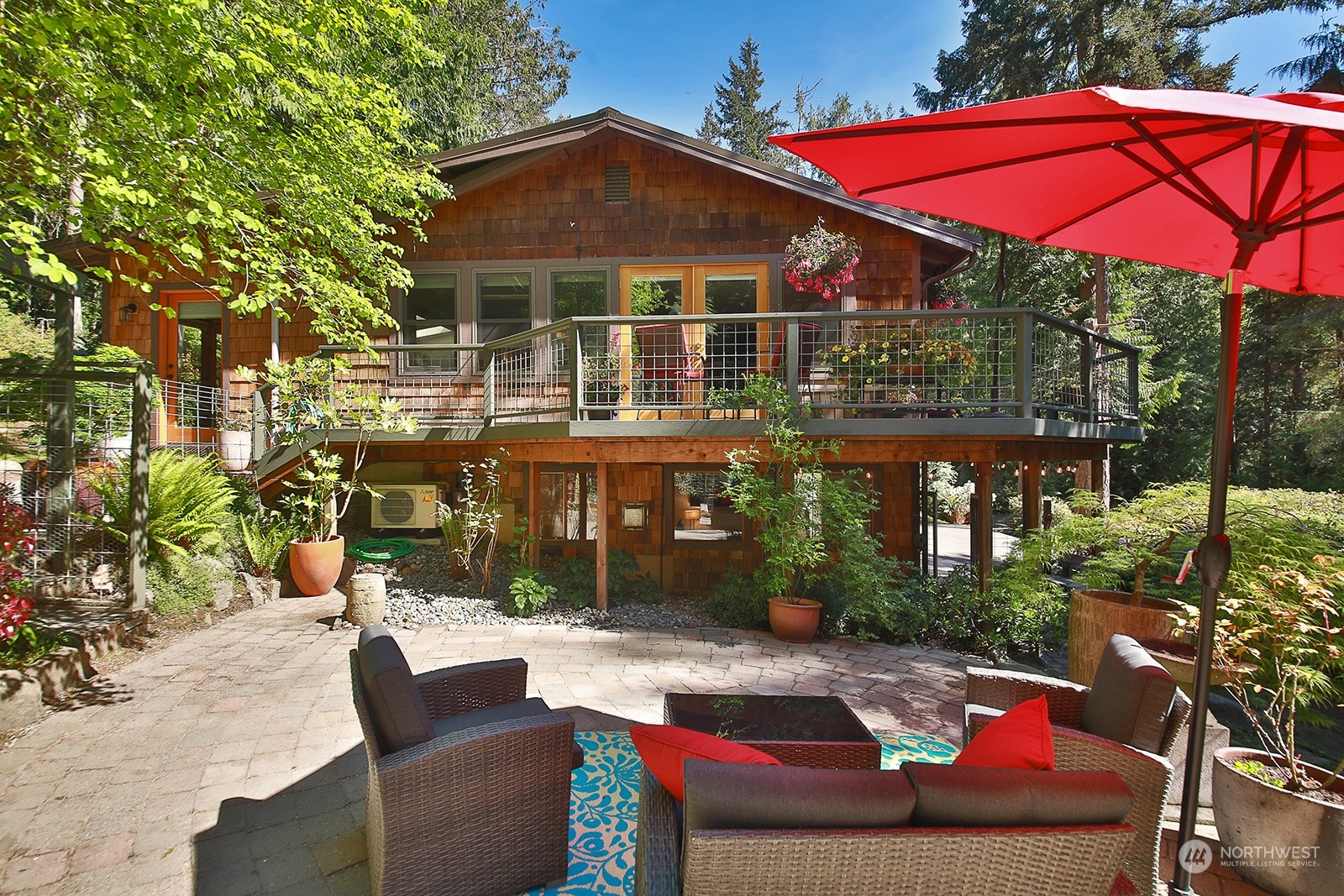 5120 Ribbit Road Langley, WA 98260 - Photo 3 of 40 a view of house with outdoor seating and yard