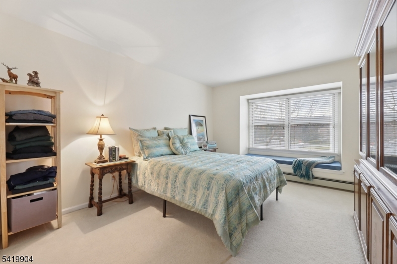 7 Valen Court Franklin Lakes, NJ 07417 - Photo 16 of 32 a bedroom with a bed and a window
