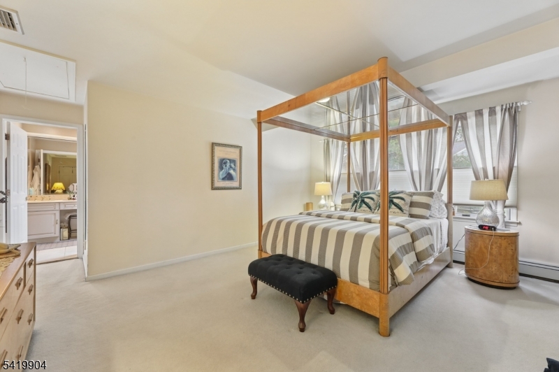 7 Valen Court Franklin Lakes, NJ 07417 - Photo 21 of 32 a bedroom with furniture and a window
