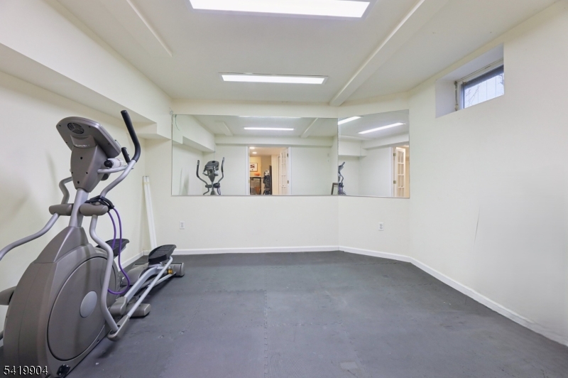 7 Valen Court Franklin Lakes, NJ 07417 - Photo 28 of 32 a view of a room with gym equipment