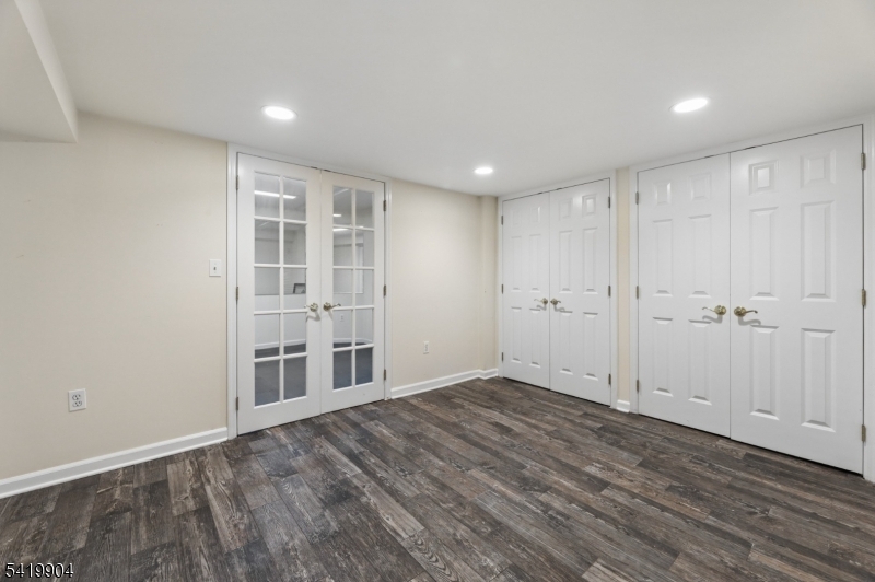 7 Valen Court Franklin Lakes, NJ 07417 - Photo 29 of 32 a view of an empty room with wooden floor