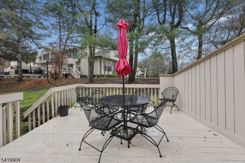 7 Valen Court Franklin Lakes, NJ 07417 - Photo 30 of 32 a view of a chair and tables in the terrace