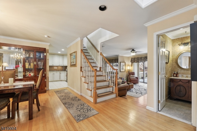 7 Valen Court Franklin Lakes, NJ 07417 - Photo 4 of 32 a bedroom with furniture and a wooden floor
