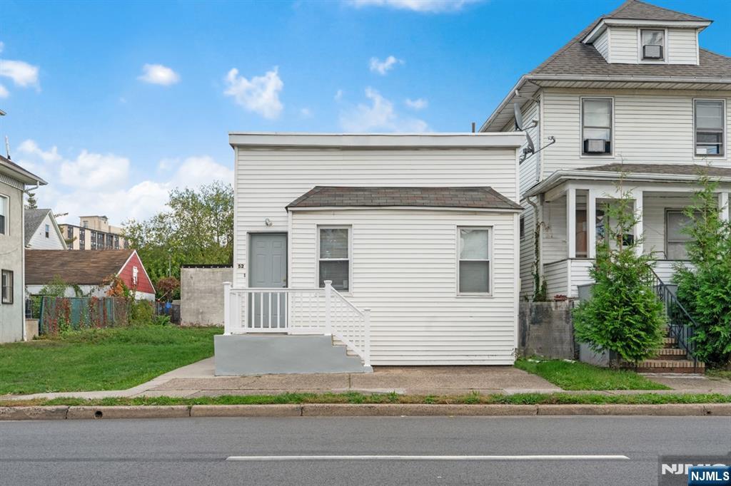 52 South State Street Hackensack, NJ 07601 - Photo 8 of 14 a view of a house with a yard