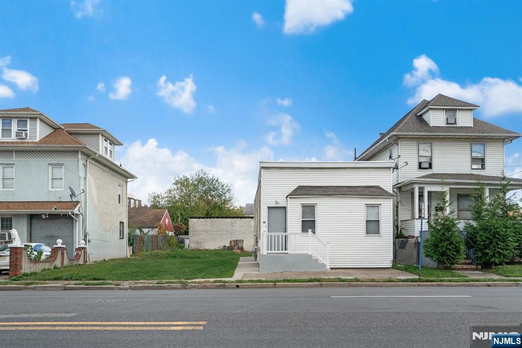 52 South State Street Hackensack, NJ 07601 - Photo 9 of 14 a front view of a house with a yard