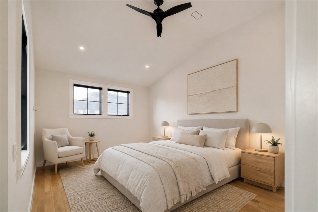 17 South Waverly Street, Unit 17 Boston, MA 02135 - Photo 20 of 29 a bedroom with a bed and window