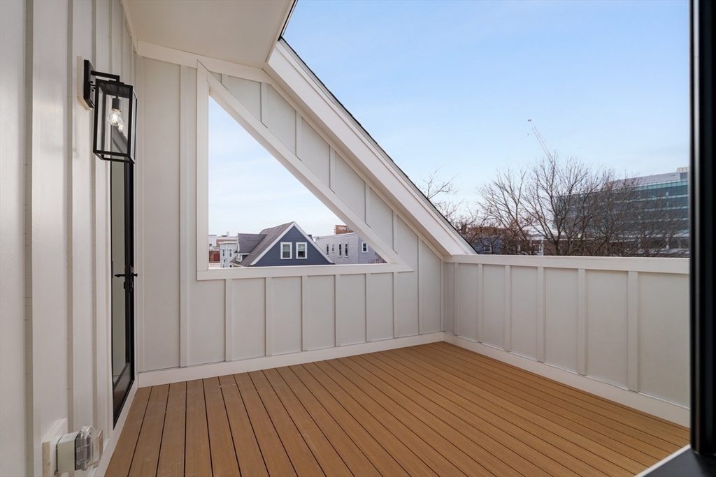 17 South Waverly Street, Unit 17 Boston, MA 02135 - Photo 23 of 29 a view of a house with wooden floor