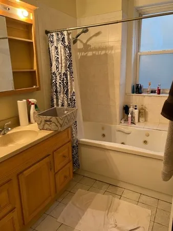 a bathroom with a sink and a bathtub