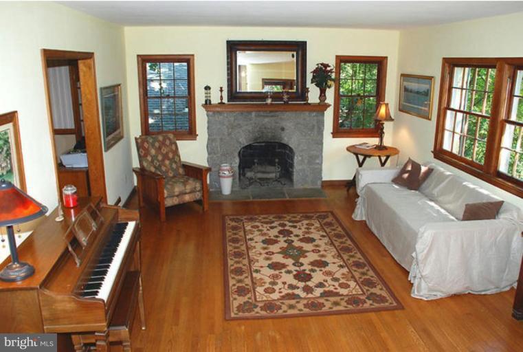 10212 Sutherland Road Silver Spring, MD 20901 - Photo 5 of 21 Great Living room with stone fireplace