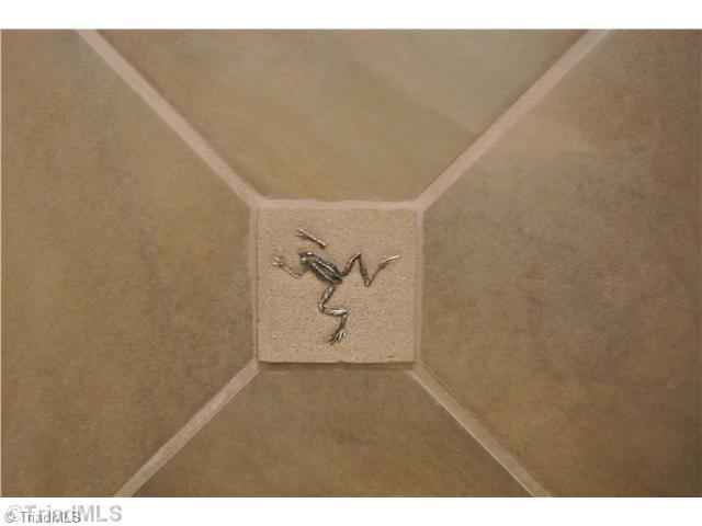 8522 Rosedale Drive Oak Ridge, NC 27310 - Photo 14 of 16 Bath. fun tile work in 3rd bedroom bath